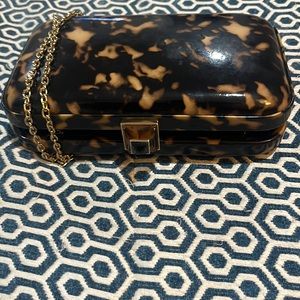Banana Republic Clutch tortoise. 8 1/2”c 5” x 2”. Detachable chain. Excellent.